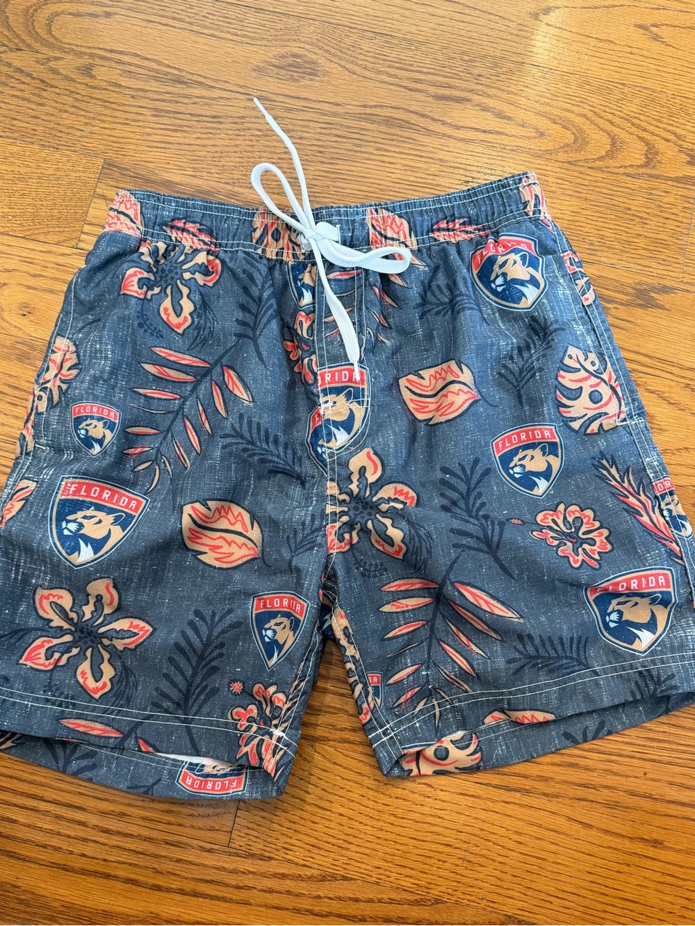 Florida Panthers NHL Men’s Navy Floral Swim Trunks